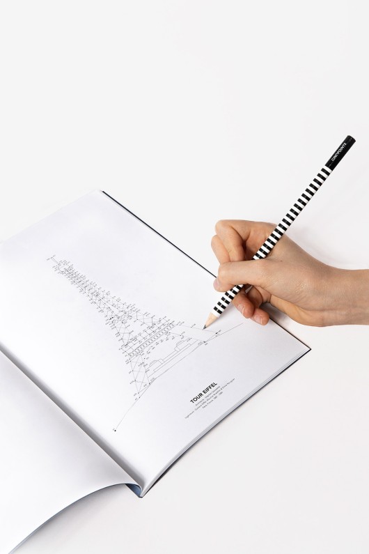 dot-to-dot Paris book - hand connecting dots with pencil