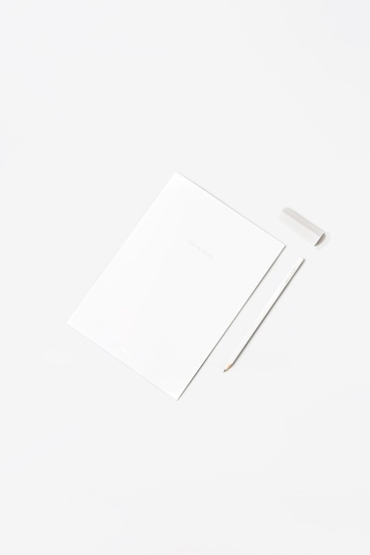 white-archiquote-sketchbook-laying-with-pencil-and-rubber