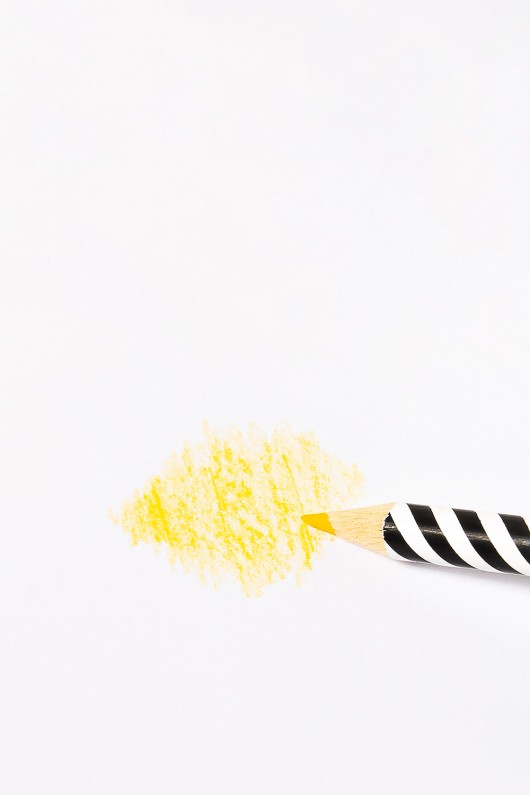 yellow-striped-colour-pencil-colouring-a-sheet