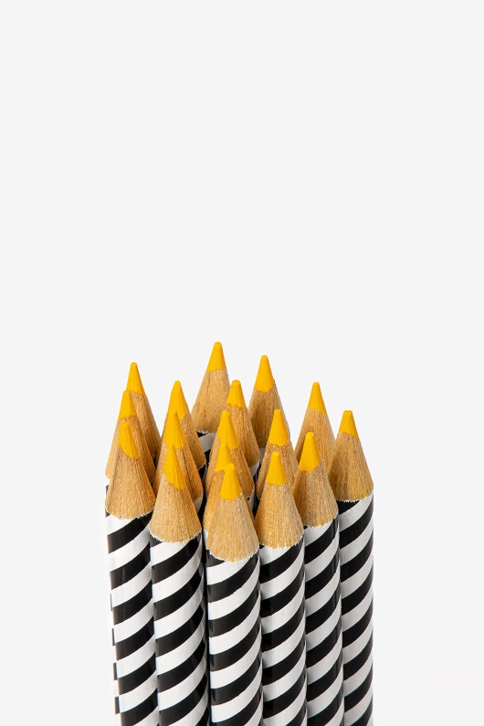 yellow-striped-colour-pencils-with-tips-facing-up