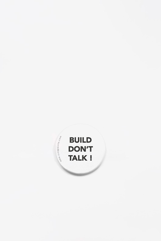 white badge - build don't talk