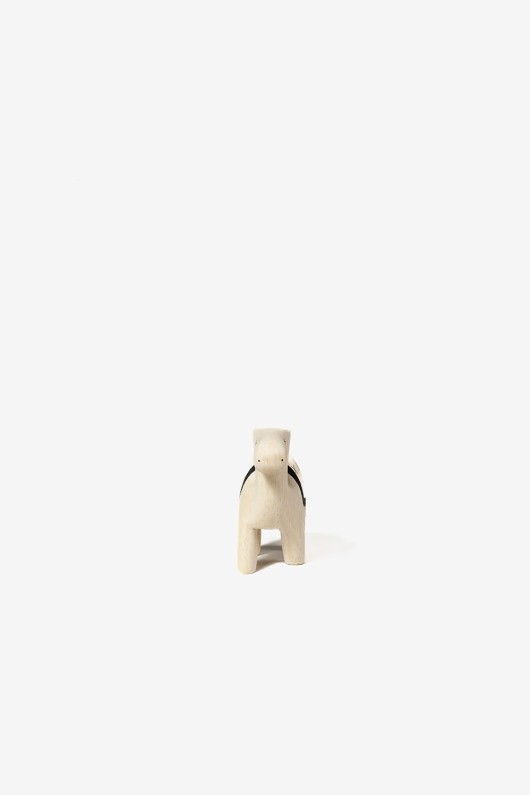 small wooden camel - front view