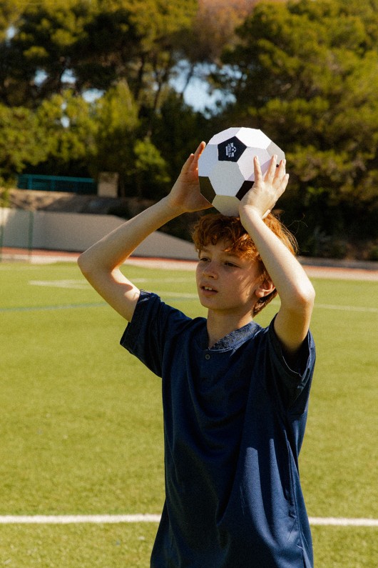 Boy with 3D puzzle Football soccer